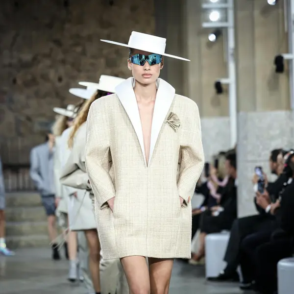 Which fashion house presented this look on the runway?