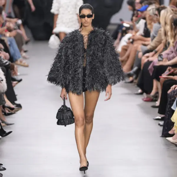 Which fashion house presented this look on the runway?