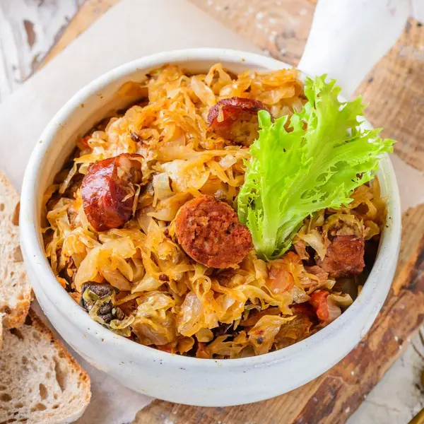 Bigos is a traditional dish made from: