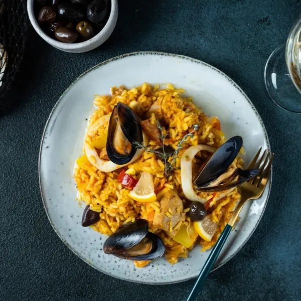 Paella is a dish made from: